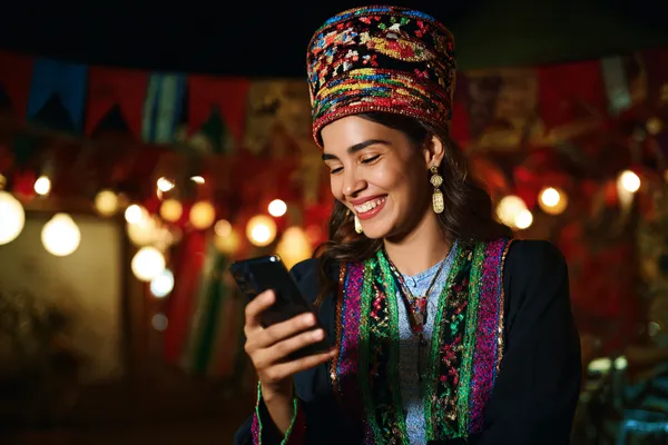 A confident dealer surrounded by casino chips inviting players to access their BK33 account, reflecting quick and easy login options.